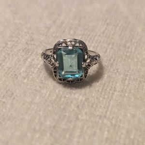 Vintage sterling silver and blue topaz ring